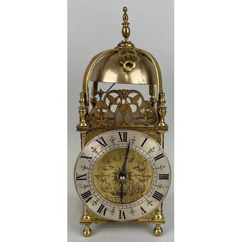 562 - A 19TH CENTURY BRASS CLOCK