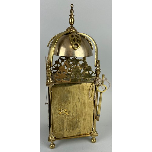 562 - A 19TH CENTURY BRASS CLOCK