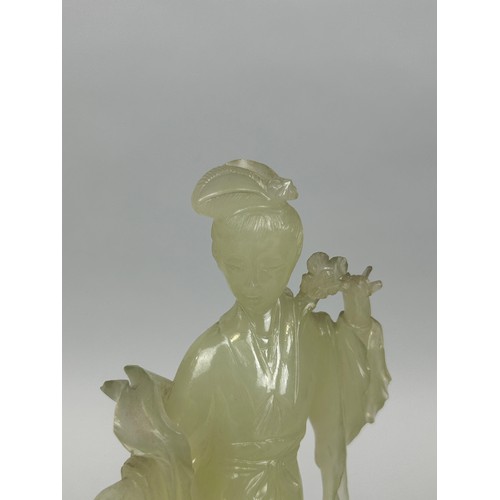 104 - A 20TH CENTURY CHINESE JADEITE FIGURE OF A GUANYIN ON STAND, 

18cm H