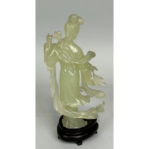 104 - A 20TH CENTURY CHINESE JADEITE FIGURE OF A GUANYIN ON STAND, 

18cm H