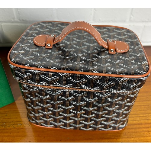 193A - A GOYARD MUSE VANITY CASE IN BLACK AND TAN, 

With box.