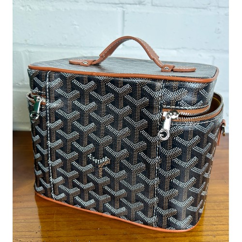 193A - A GOYARD MUSE VANITY CASE IN BLACK AND TAN, 

With box.