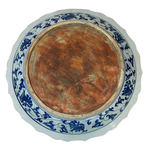 74 - A LARGE CHINESE PLATE DECORATED WITH FISH IN THE YUAN STYLE,

65cm W