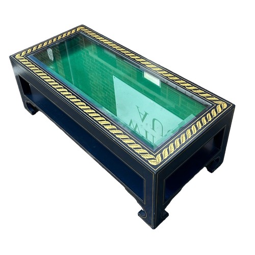 452 - A DESIGNER COFFEE TABLE WITH GLASS INSERT AND GOLD GREEK KEY BORDER, 

114cm x 53cm x 42cm