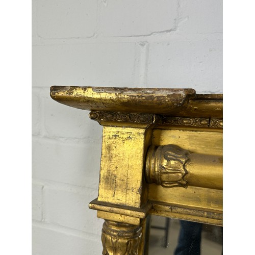 438 - A REGENCY GILT WOOD WALL MIRROR, 

93cm x 72cm

Classical columns with floral capitals.