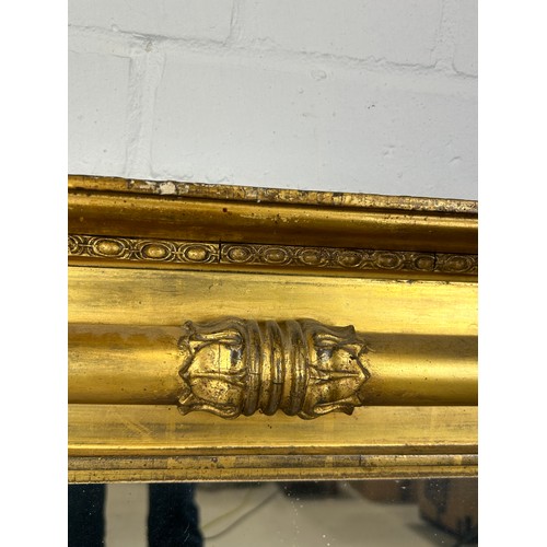 438 - A REGENCY GILT WOOD WALL MIRROR, 

93cm x 72cm

Classical columns with floral capitals.