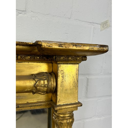 438 - A REGENCY GILT WOOD WALL MIRROR, 

93cm x 72cm

Classical columns with floral capitals.