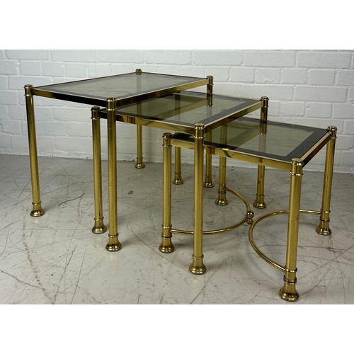 491C - A NEST OF THREE BRASS TABLES WITH GLASS INSERTS, 

Largest 58cm x 38cm x 45cm