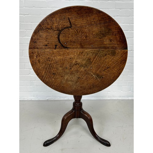 410 - A 19TH CENTURY OAK TILT TOP TRIPOD TABLE, 

75cm x 70cm