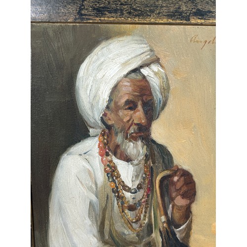 197A - ATTRIBUTED TO ANGELA TRINDADE (1909-1980): AN INDIAN OIL ON BOARD PAINTING OF A GENTLEMAN WEARING A ... 