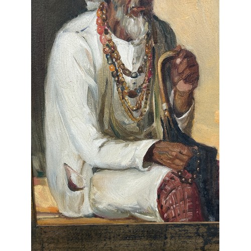 197A - ATTRIBUTED TO ANGELA TRINDADE (1909-1980): AN INDIAN OIL ON BOARD PAINTING OF A GENTLEMAN WEARING A ... 