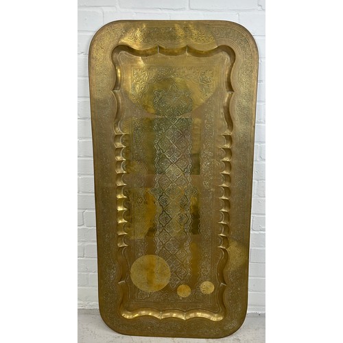 410A - AN INDIAN BRASS TABLE TOP, 

119cm x 58cm