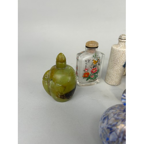 62 - A LARGE COLLECTION OF THIRTY CHINESE / ASIAN SNUFF BOTTLES (30), 

Tallest 10cm height.

Mostly 20th... 