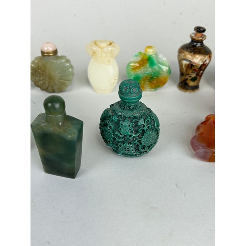 62 - A LARGE COLLECTION OF THIRTY CHINESE / ASIAN SNUFF BOTTLES (30), 

Tallest 10cm height.

Mostly 20th... 