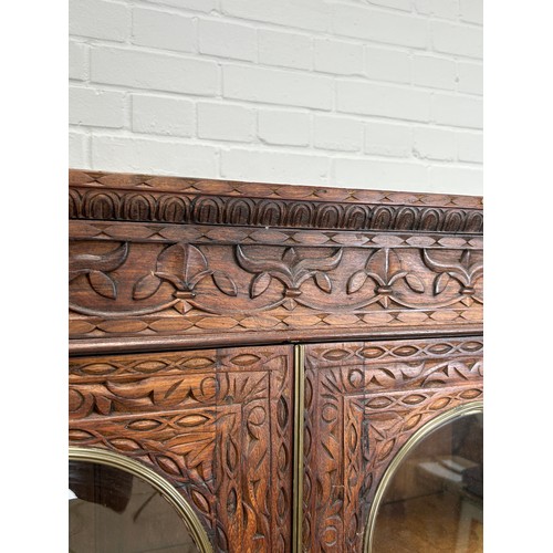 452 - A 19TH CENTURY ANGLO INDIAN ROSEWOOD SECTIONAL SECRETAIRE WITH SUNBURST DESIGN PANELS 

172cm x 92cm... 