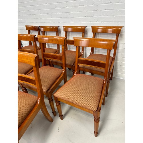 520 - A CHARLES BARR CHERRYWOOD DINING TABLE AND TWELVE CHAIRS, 

Dining table 163cm x 116cm x 76cm 
Leave... 