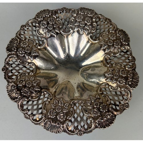 125 - A SILVER DISH MARKED FOR WILLIAM DEVENPORT, 

Pierced design with repousse flowers, on four legs. 

... 