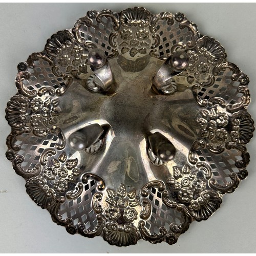 125 - A SILVER DISH MARKED FOR WILLIAM DEVENPORT, 

Pierced design with repousse flowers, on four legs. 

... 