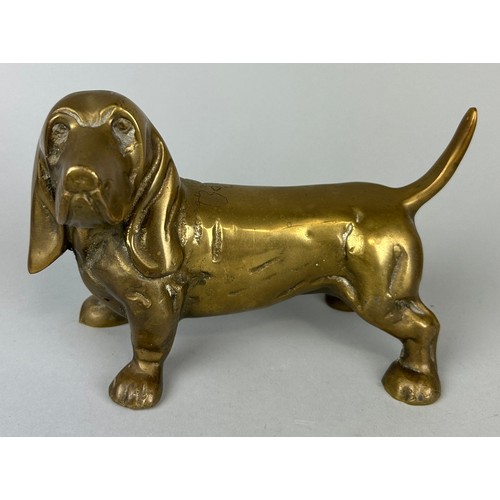 233 - A BRONZE SCULPTURE OF A DOG, 

19cm x 13cm