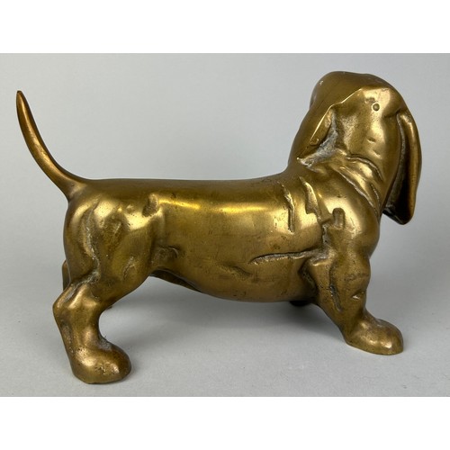 233 - A BRONZE SCULPTURE OF A DOG, 

19cm x 13cm