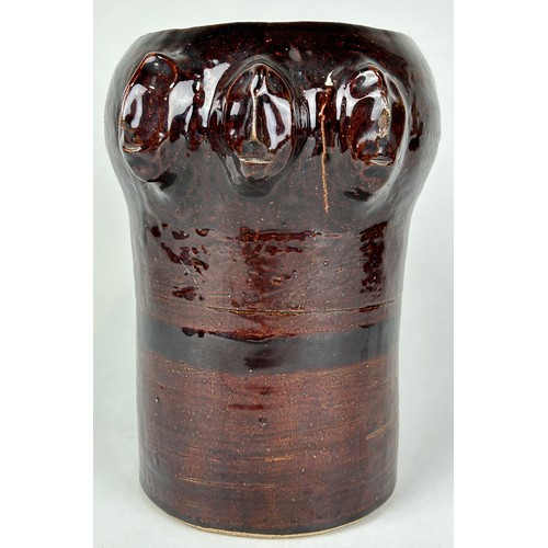 427 - AN UNUSUAL BROWN GLAZED CERAMIC VASE WITH SIX HEADS DISCOVERED AT THE BOTTOM OF RICHMOND PARK LAKE, ... 