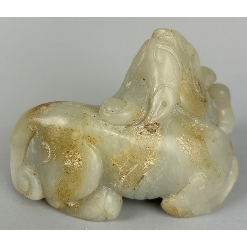 246 - A CHINESE JADE FIGURE OF A LION IN THE ARCHAIC STYLE,

17cm x 10cm