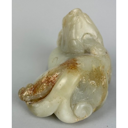 246 - A CHINESE JADE FIGURE OF A LION IN THE ARCHAIC STYLE,

17cm x 10cm