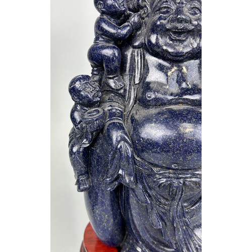 247 - A LARGE CHINESE LAPIS LAZULI SCULPTURE DEPICTING THE BUDDHA WITH CHILDREN, 

30cm x 16cm 

With rose... 