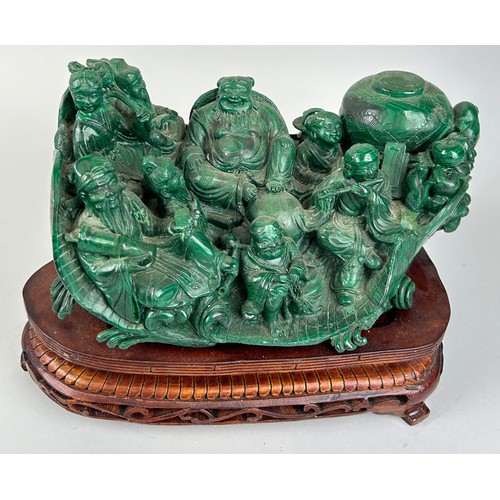 244 - A CHINESE MALACHITE SCULPTURE DEPICTING A BUDDHA WITH FIGURES PLAYING MUSICAL INSTRUMENTS, 

30cm x ... 