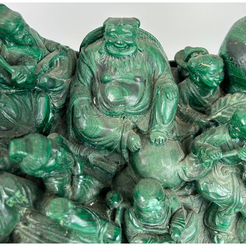 244 - A CHINESE MALACHITE SCULPTURE DEPICTING A BUDDHA WITH FIGURES PLAYING MUSICAL INSTRUMENTS, 

30cm x ... 