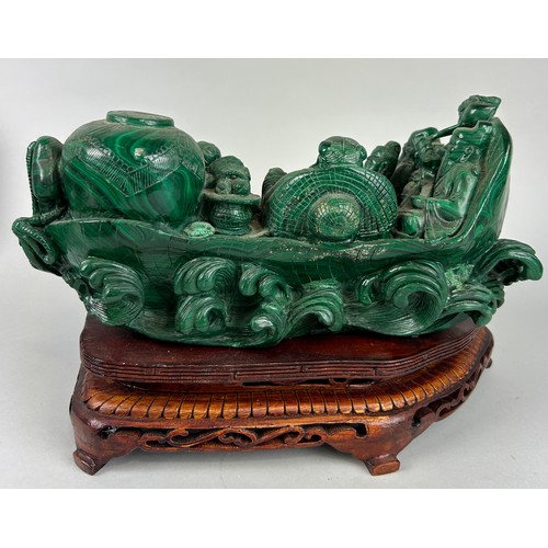 244 - A CHINESE MALACHITE SCULPTURE DEPICTING A BUDDHA WITH FIGURES PLAYING MUSICAL INSTRUMENTS, 

30cm x ... 