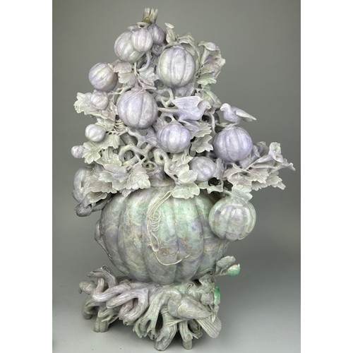 245 - A VERY LARGE AND HEAVY CHINESE JADE SCULPTURE DEPICTING FRUITS, BIRDS AN FOLIAGE, 

67cm H x 43cm W