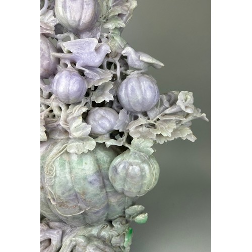 245 - A VERY LARGE AND HEAVY CHINESE JADE SCULPTURE DEPICTING FRUITS, BIRDS AN FOLIAGE, 

67cm H x 43cm W