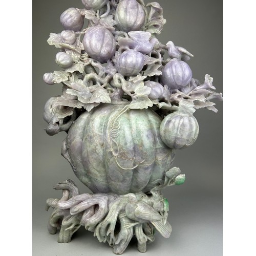 245 - A VERY LARGE AND HEAVY CHINESE JADE SCULPTURE DEPICTING FRUITS, BIRDS AN FOLIAGE, 

67cm H x 43cm W