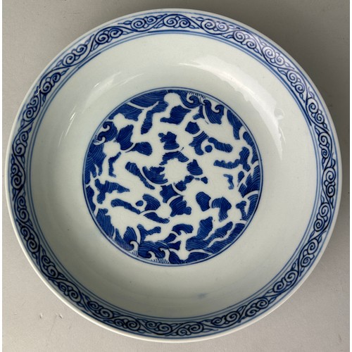 67 - A CHINESE BLUE AND WHITE PLATE, 

Six character mark to verso. 

18cm D