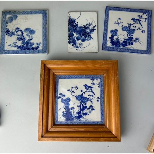 75 - A GROUP OF FOUR CHINESE BLUE AND WHITE CERAMIC TILES, 

Largest 15cm x 15cm