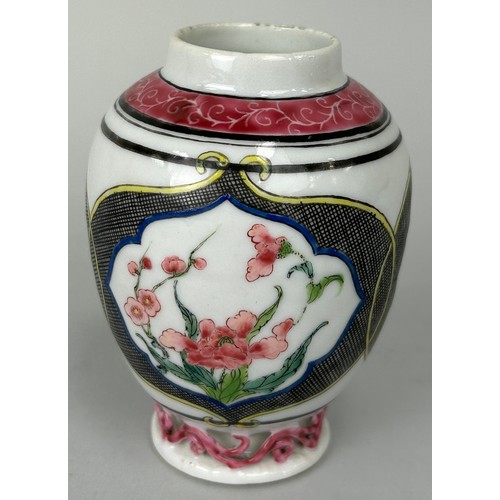 70 - A CHINESE WHITE AND PINK VASE DECORATED WITH FLOWERS, 

Possibly Yongzheng period. 

11cm H