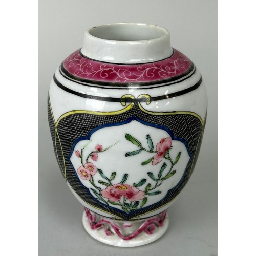 70 - A CHINESE WHITE AND PINK VASE DECORATED WITH FLOWERS, 

Possibly Yongzheng period. 

11cm H