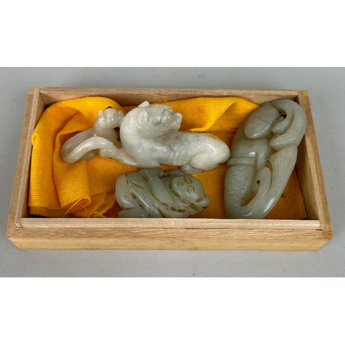 77 - THREE CHINESE JADE FIGURES, 

Largest 7.5cm L