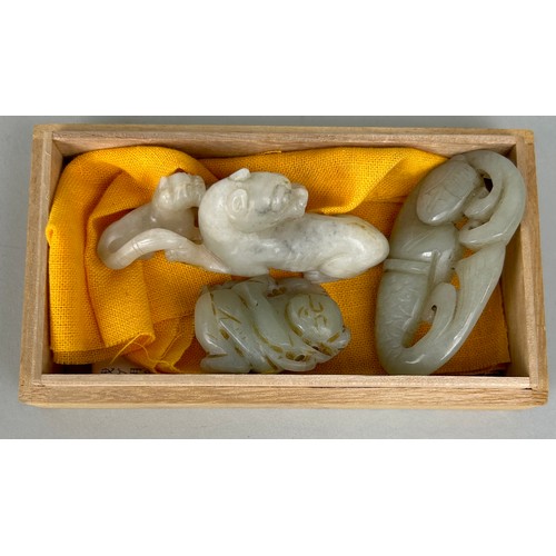 77 - THREE CHINESE JADE FIGURES, 

Largest 7.5cm L