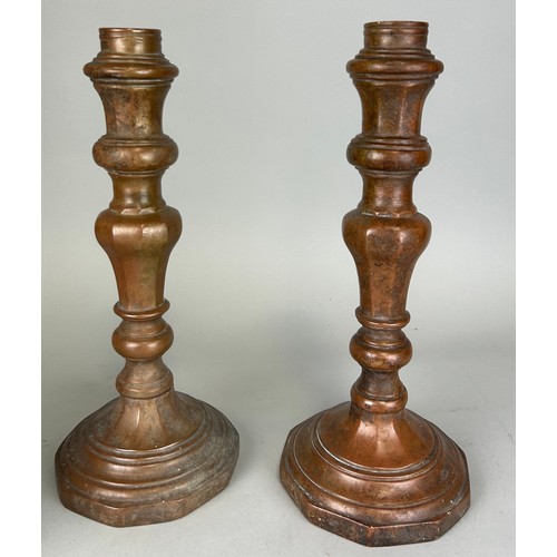 181 - A PAIR OF PORTUGUESE CANDLESTICKS POSSIBLY 18TH CENTURY, 

35cm H each.