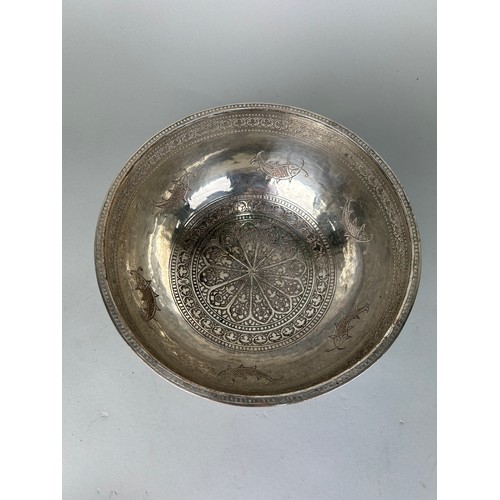 121 - A PERSIAN SILVERED COPPER BOWL CHASED WITH FISH MOTIF, 

20cm x 10cm 

Possibly 19th Century.