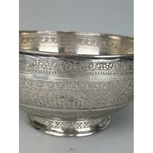 121 - A PERSIAN SILVERED COPPER BOWL CHASED WITH FISH MOTIF, 

20cm x 10cm 

Possibly 19th Century.