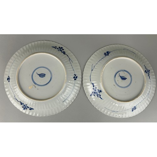 69 - A PAIR OF CHINESE BLUE AND WHITE KANGXI PERIOD PLATES, 

Leaf mark to verso. 

26cm D each.