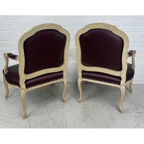 477 - A PAIR OF FRENCH LOUIS XVI STYLE FAUTEUILS, 

Upholstered in purple fabric 

95cm x 65cm x 55cm each... 