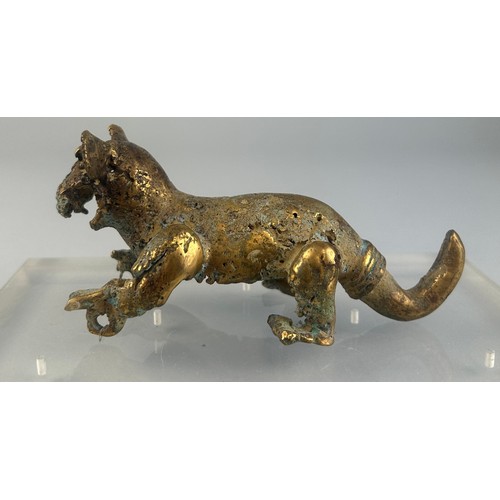 87 - A PRE-COLUMBIAN TUMBAGA JAGUAR EFFIGY, 

From Costa Rica/Panama, Veraguas-Greater Chiriquí

Circa 80... 