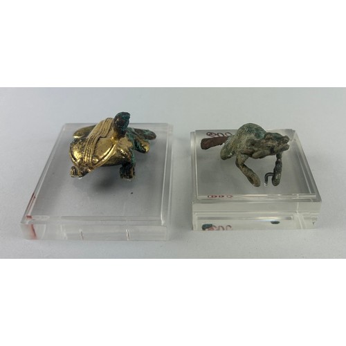 113 - TWO PRE-COLUMBIAN TUMBAGA FROG ORNAMENTS: 

From Costa Rica/Panama, Veraguas-Greater Chiriquí. 

Cir... 