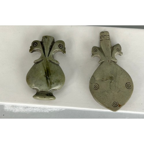 183 - TWO ISLAMIC SERPENTINE KOHL FLASKS, 

Used to hold Kohl, a black cosmetic powder applied around the ... 