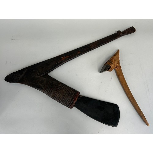 193 - TWO PAPUA NEW GUINEA AXES, 

One from Masim region, the other from highlands. 

Largest 60cm x 48cm