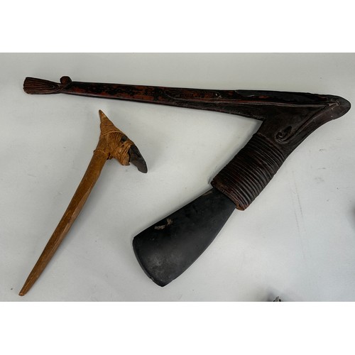 193 - TWO PAPUA NEW GUINEA AXES, 

One from Masim region, the other from highlands. 

Largest 60cm x 48cm